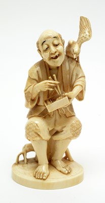 Lot 488 - Japanese ivory Okimono figure and bird