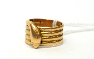 Lot 110 - An Edwardian 18ct gold coiled serpent ring