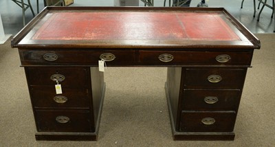 Lot 69 - An early 20th C pedestal desk.