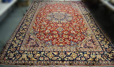 Lot 82 - A Kashan carpet.