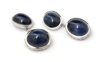 Lot 128 - A fine pair sapphire and diamond cufflinks