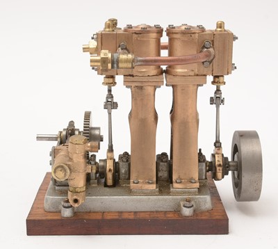 Lot 298 - A vertical two-cylinder live steam marine engine