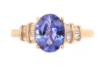 Lot 59 - A tanzanite and diamond ring