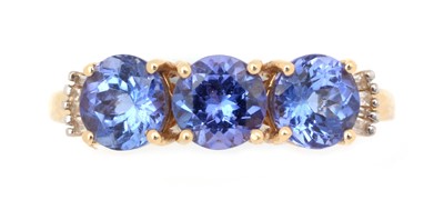 Lot 60 - A tanzanite and diamond ring
