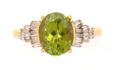 Lot 64 - A peridot and diamond ring