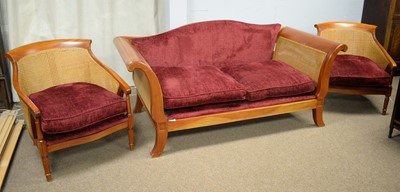 Lot 49 - Modern mahogany Bergere sofa and two armchairs.