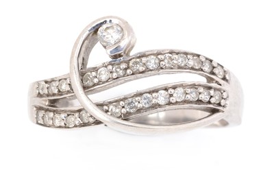 Lot 73 - A diamond dress ring