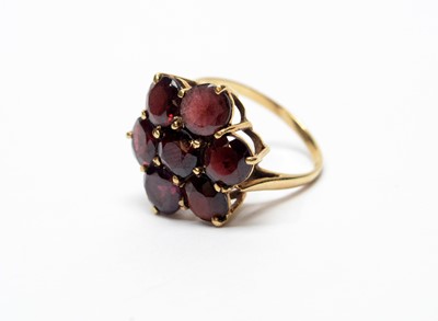 Lot 243 - A garnet cluster ring
