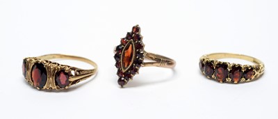 Lot 245 - Three garnet rings