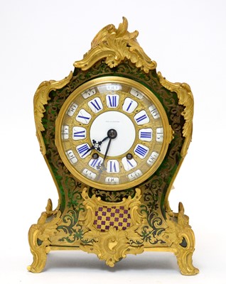 Lot 561 - Louis XV style boulle work and gilt bronze mantel clock.