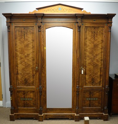 Lot 119 - Victorian pitch pine triple wardrobe.