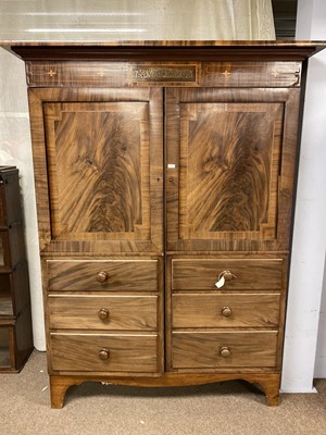 Lot 85 - A 20th Century mahogany wardrobe.