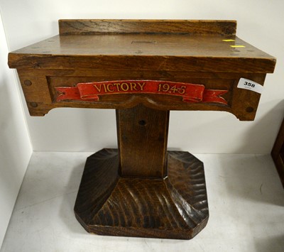 Lot 358 - A WWII-era stained oak lectern.