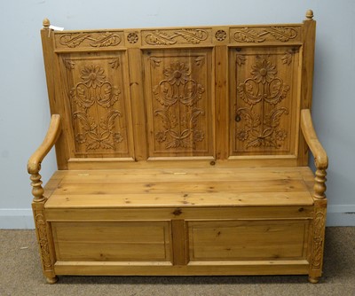 Lot 21 - A modern carved pine hall seat in the Victorian style
