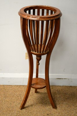 Lot 43 - An Edwardian-style oak jardiniere stand