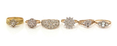 Lot 326 - Six white stone set cluster rings