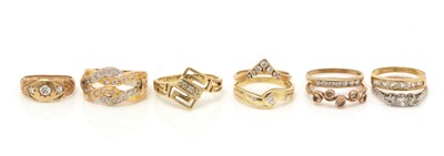 Lot 329 - Nine white stone set dress rings
