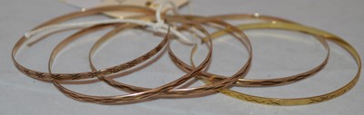 Lot 220 - Five 9ct yellow gold bangles