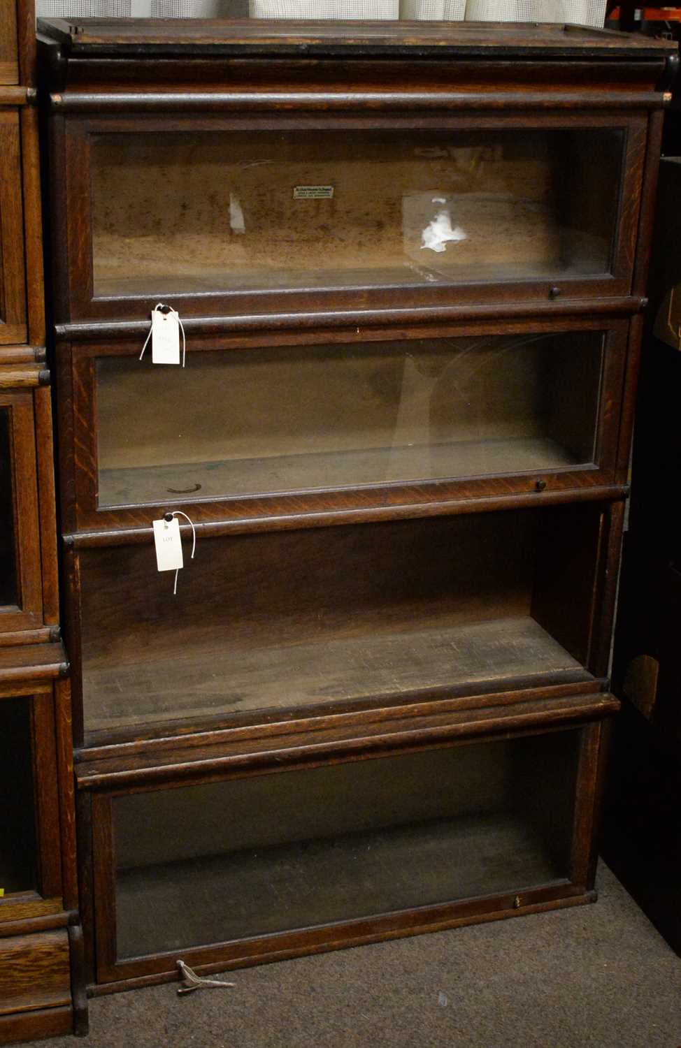 Lot 84 - A Globe-Wernicke oak four-tier bookcase
