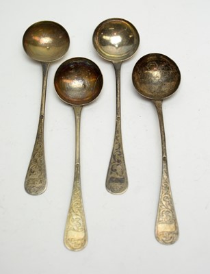 Lot 188 - A set of four Indian table spoons