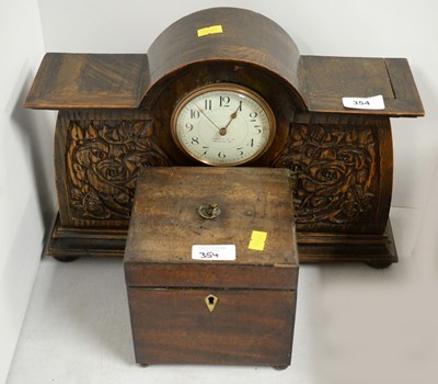 Lot 354 - An oak mantel clock, retailed by Liberty & Co.