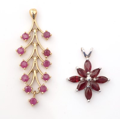 Lot 143 - Two ruby pendants