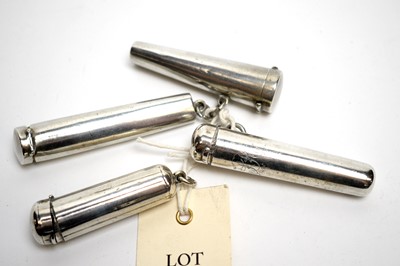 Lot 113 - Four silver cigar holder cases