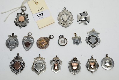 Lot 127 - A selection of silver and white metal fobs