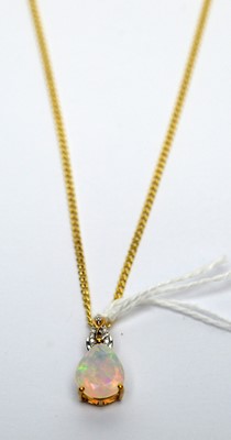 Lot 208 - An opal and diamond pendant