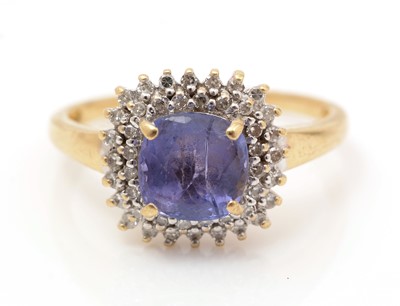 Lot 445 - Tanzanite and diamond cluster ring