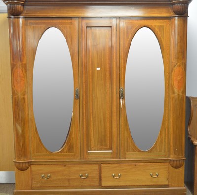 Lot 98 - An Edwardian inlaid walnut three door wardrobe.