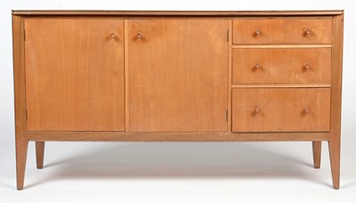 Lot 424 - Storys, London; a mid-Century walnut sideboard