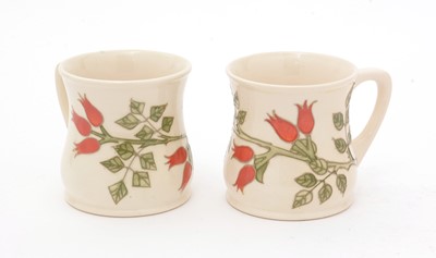 Lot 487 - Two Moorcroft mugs Sally Tuffin