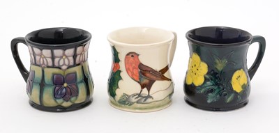 Lot 489 - Three Moorcroft Mugs