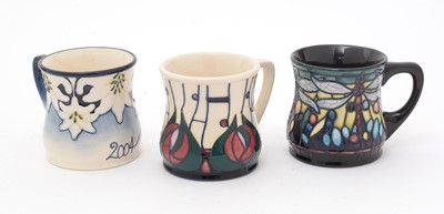 Lot 490 - Three Moorcroft mugs