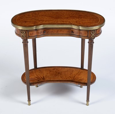 Lot 1088 - A Louis XVI style walnut and rosewood cross banded etagere