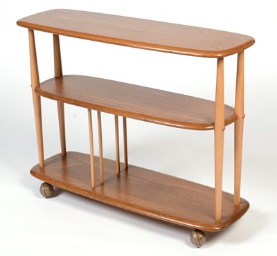 Lot 371 - Ercol; an elm and beech trolley bookcase, No 361.