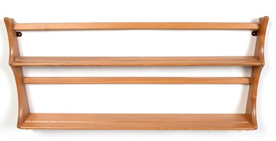 Lot 443 - An Ercol: an elm plate rack No. 268.