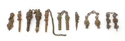 Lot 944 - A selection of Edan Ogboni staffs/rods.