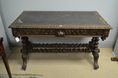Lot 103 - A Victorian carved oak library table.