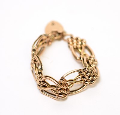 Lot 123 - A yellow metal gate link bracelet