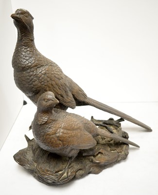 Lot 457 - A bronzed resin sculpture of a pair of pheasants.