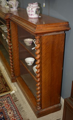 Lot 1091 - A large late Victorian walnut breakfront open bookcase