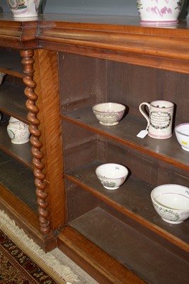 Lot 1091 - A large late Victorian walnut breakfront open bookcase
