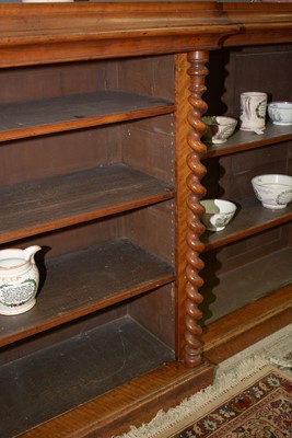 Lot 1091 - A large late Victorian walnut breakfront open bookcase