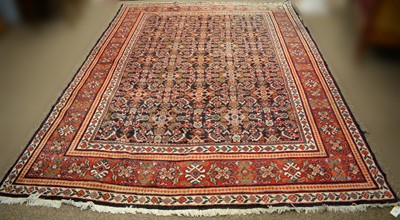 Lot 91A - An Eastern bordered carpet.