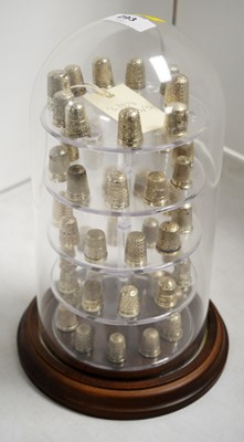 Lot 293 - A collection of silver thimbles.