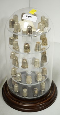 Lot 288 - A collection of silver thimbles.
