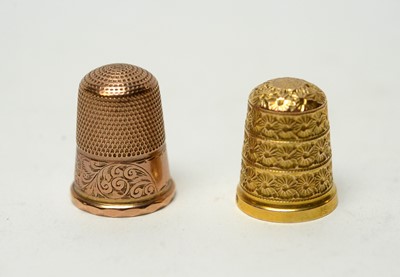 Lot 294 - Two 9ct gold thimbles.