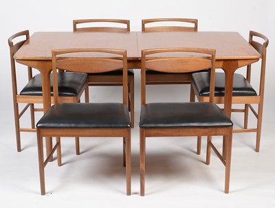Lot 385 - A. H. McIntosh & Co. Ltd, Kirkcaldy: a mid Century teak extending dining table and six chairs.
